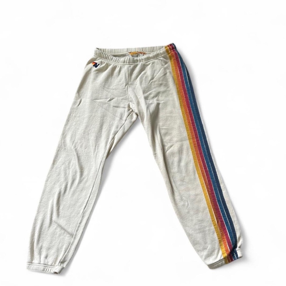 Tan Aviator Nation sweatpants with rainbow stripes down side